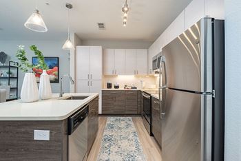 Stainless steel ge appliances include refridgerator, microwave, dishwasher and oven
